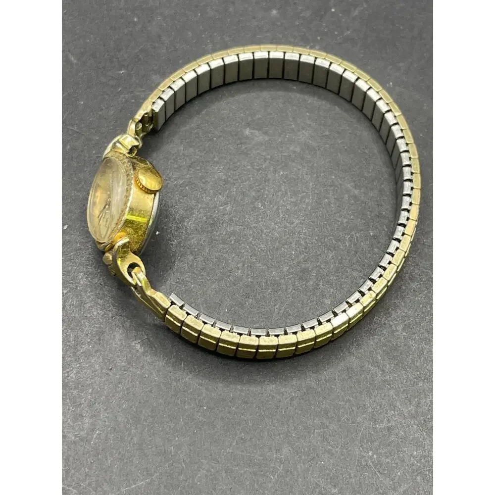 Vintage Timex Watch Women's Gold Tone Round Stretch Band Manual Wind Up 16mm